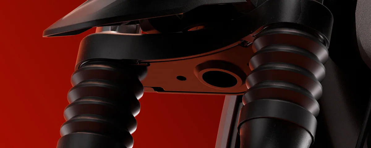 Suspensions avant de la Segway ZT3 Pro E en gros plan, lumière rouge
